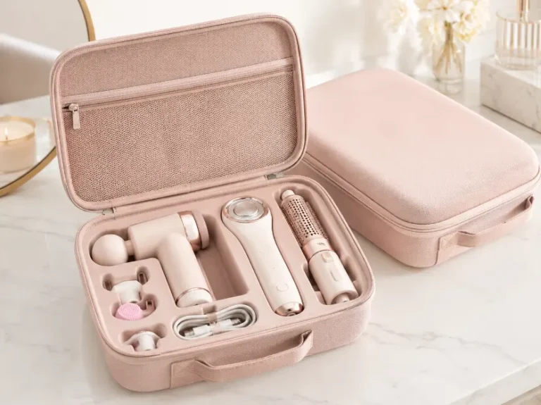 Custom EVA beauty case for personal care devices, including massage gun, facial care tools, hair styling brush and accessories with molded foam insert and mesh pocket