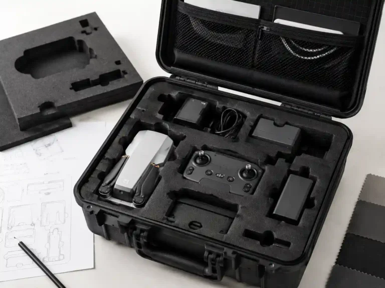 Custom EVA drone case with precision-cut foam insert, mesh pocket, hard protective shell and compartments for drone, controller, batteries and accessories
